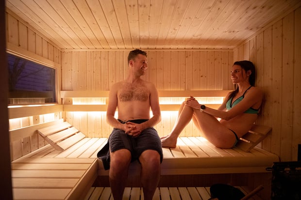 two people in a sauna room
